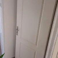 درب اتاقی یکی ملامینه نو ، یکی معمولی در حد