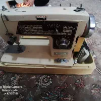 چرخ خیاطی (دکمه زن)