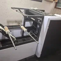 دستگاه رول کن سفره یکبار مصرف ۳کاره