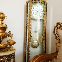 ساعت ایستاده ی برنز