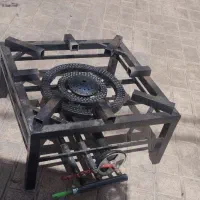 اجاق گاز و قابلمه سیخ