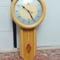 ساعت دیواری طرح چوب سالمه سالم