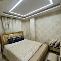 کاغذدیواری قرنیز کناف پارکت کفپوش برچسب چمن مصنوعی