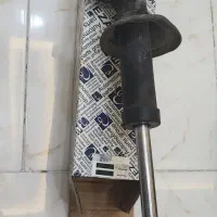 کمک فنر کوییک جلو سمت چپ و تعدادی لنت خودرو