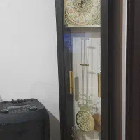 ساعت دیواری ایستاده و دو عدد تابلو دیواری