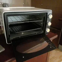 توستر و ملاقه بزرگ یا آبگردان