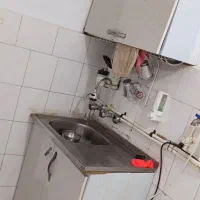 گاز استیل درحدنو کابینت صرفشوبی اب چکان