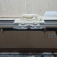 یک عدد دستگاه بافندگی