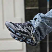 کتونی نیوبالانس ۲۰۰۰ مشکی طوسی آبی ژل دار