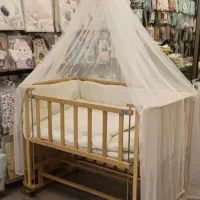 گهواره کنار مادر (کودک و نوجوان)