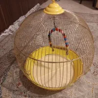 قفس قناری مدل گرد جنس استیل فقط یکدونه تاب داره