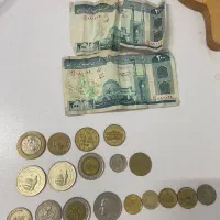 تعدادی پول و سکه قدیمی ایرانی و خارجی