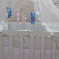 تخت کنار مادر گهواره ای