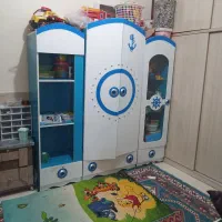 کمد ویترین وتخت کودک تمیز سالم