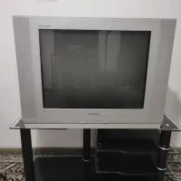 تلویزیون ۲۹ اینج کره ای صفحه تخت به همراه میز