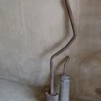 اگزوز و انبار وسط پژو