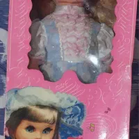 عروسک موزیکال چرخشی