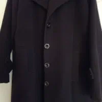 مقداری زیادی لباس مانتو و شلوار