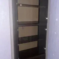 کمد شیشه ای کتاب و لوازم تحریر و....