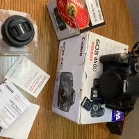 دوربین canon 450D با لنز 50mm آکبند
