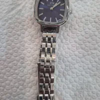 ساعت مچی  زنانه و دو جفت گوشواره