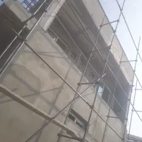 داربست نما کفراژ زیر بتن بنر