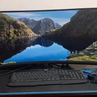 کامپیوتر ایسوز با مانیتور خمیده بزرگ