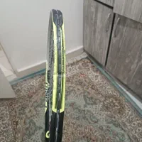 راکت تنیس همراه با توپ