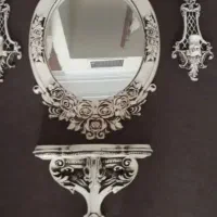 اینه و شمعدان و کنسول زیرش بفروش میرسد