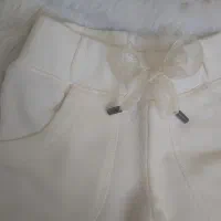شلوار راحتی دخترانه سفید مدل فون‌دار