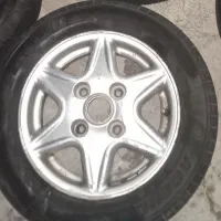 ۴رینگ  با۴لاستیک خارجی ۹۰درصد پرایدی.