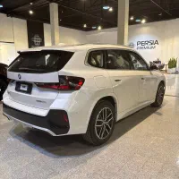 بی‌ام‌و iX1 eDrive 25L، مدل ۲۰۲۵ سفید تو قرمز|خودرو سواری و وانت|تهران, نیاوران|دیوار