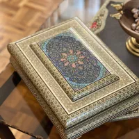 جعبه قرآن خانم و کتاب قرآن