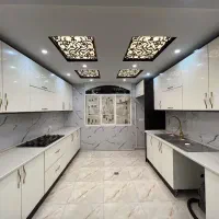 فروش-واحد72-متری-پارکینگ-اصلی-تک-واحدی-نما-تراورتن