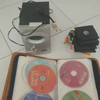 اسپیکر سالم .کیف چرم سی دی ۸۰ تایی و تعدای فلاپی
