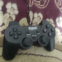 دسته کامپیوتر و هدفون