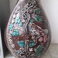 فروشی کوزه+دوقفسه کتاب‌و‌جای گلدان.