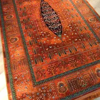 فرش ابریشمی طرح دستباف نقشه درخت زندگی نارنجی