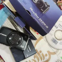 دوربین دیجیتال کنون ۱۴ مگاپیکسلی|دوربین عکاسی و فیلم‌برداری|اندیشه, اندیشه فاز ۴|دیوار