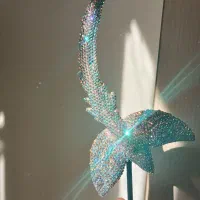 مجسمه پرنده نگین کاری شده