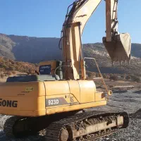 اجاره بیل میکانیکی همراه با چکش و کمپرسی