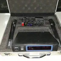 میکروفنن و بیسیم به همراه دستگاهش درحدنو