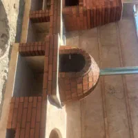 اجرای شومینه هیزمی  و  گازی  باربیکیو زغالی و گازی