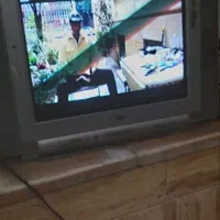 تلویزیون همراه با دستگاه دیجیتال