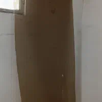 شیشه دودی میز ناهار خوری و کابینت زیر اوپن