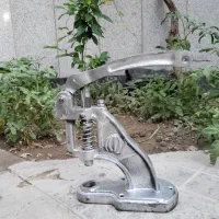 دستگاه پرس دکمه