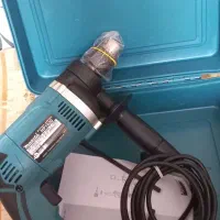 دریل ماکیتاژاپن۷۱۰وات بسفارش رومانی.دلرچکشی ماکیتا