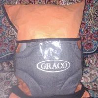 آغوشی نوزاد|کفش و لباس بچه|قم, قلعه کامکار|دیوار