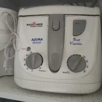 پلو پز و تلفن رومیزی و سرخ کن وآسیاب ودیویدی