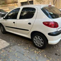 پژو ۲۰۶ مدل ۹۷ بدون رنگ وبدون نقطه کاملا مشابه صفر|خودرو سواری و وانت|تهران, تهرانپارس غربی|دیوار